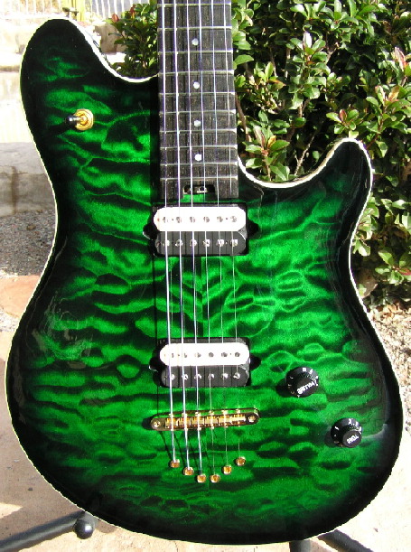string-thru construction with green quilted top, ebony fretboard